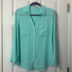Light blue button up with double breast pockets